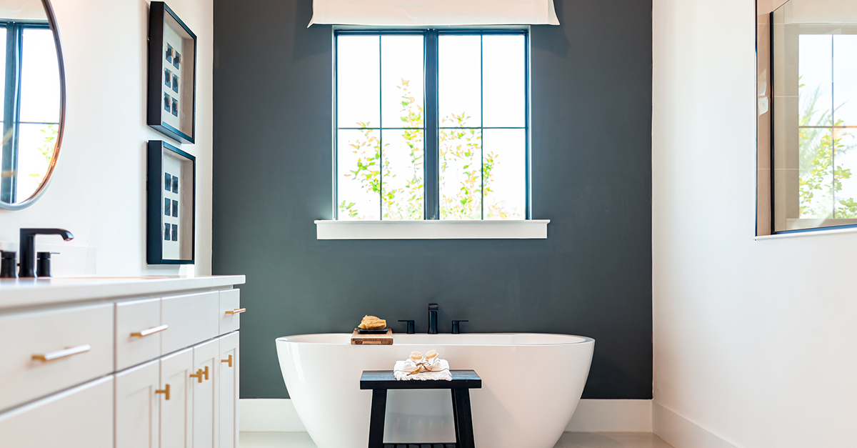 A remodeled bathroom with freestanding tub